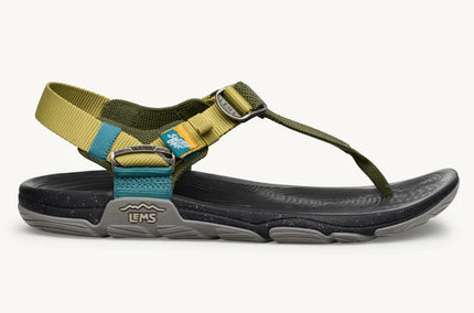 Green sandal with straps on a white background