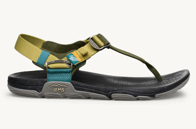 Green sandal with straps on a white background