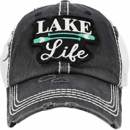 Distressed black baseball cap with Lake Life embroidered in white and two green paddles