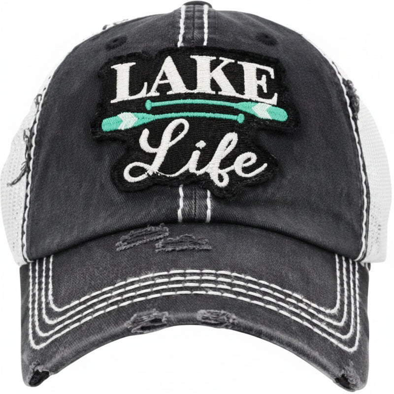 Distressed black baseball cap with Lake Life embroidered in white and two green paddles