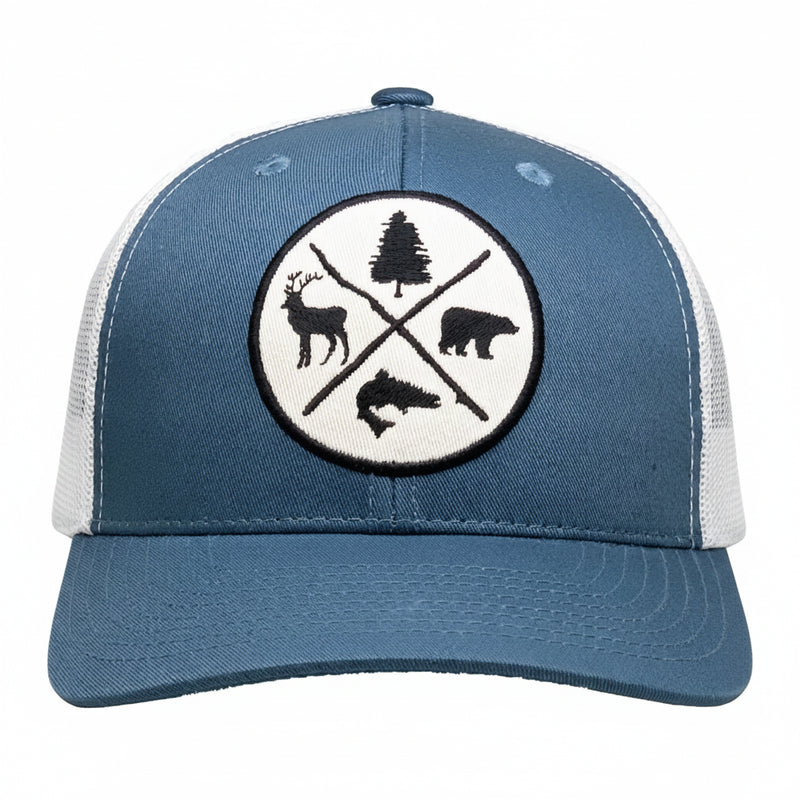 Blue and white trucker hat with a circular patch featuring a deer, bear, fish, and pine tree
