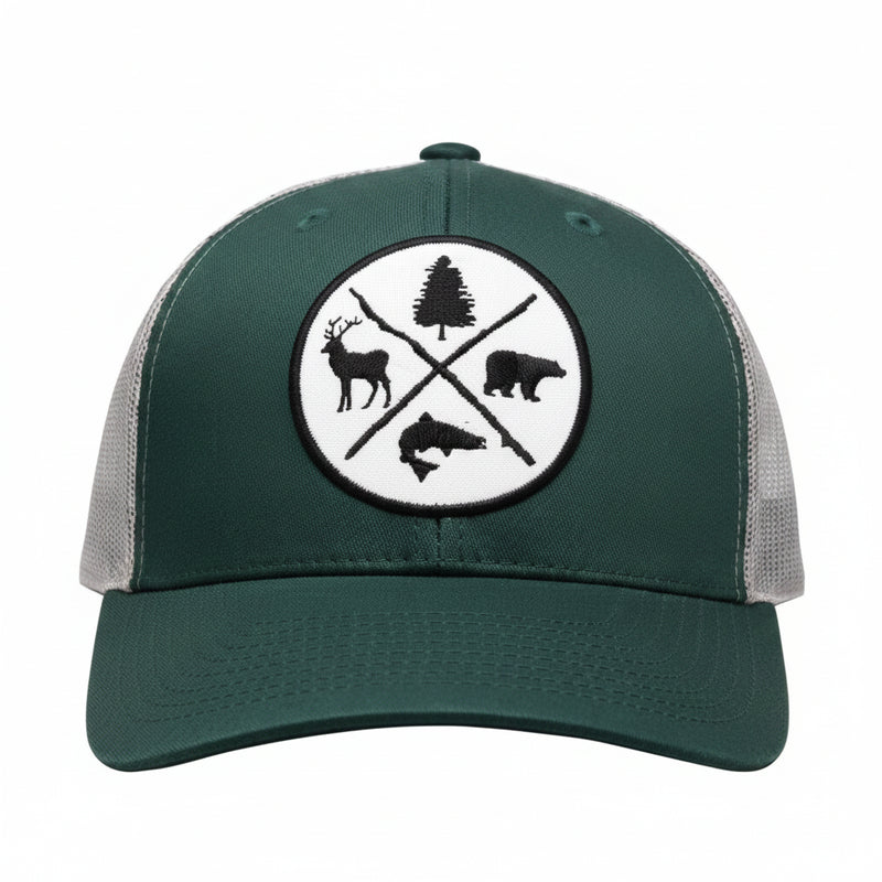 Green trucker hat with a white circular patch featuring a deer, tree, bear, and fish