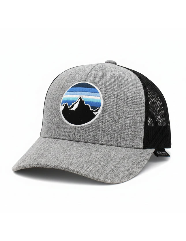 Gray and black trucker hat with a circular mountain and sky logo