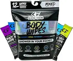 Klean Freaks Body Wipes 12-pack mixed scents with individual wipes in purple, blue, teal, and yellow packaging