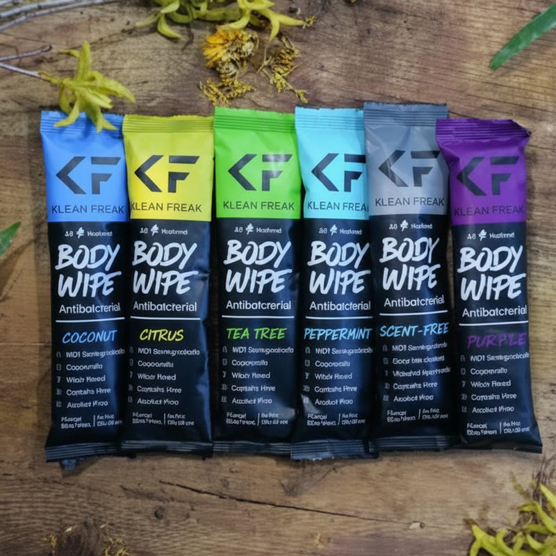 Six individually packaged body wipes in various colors and scents