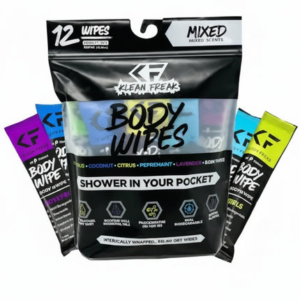 Klean Freaks Body Wipes 12-pack mixed scents with individual wipes in purple, blue, green, and yellow packaging