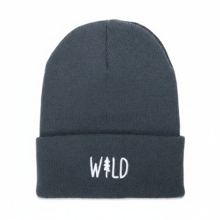 Dark grey beanie with white embroidered text WILD, where the I is a pine tree graphic