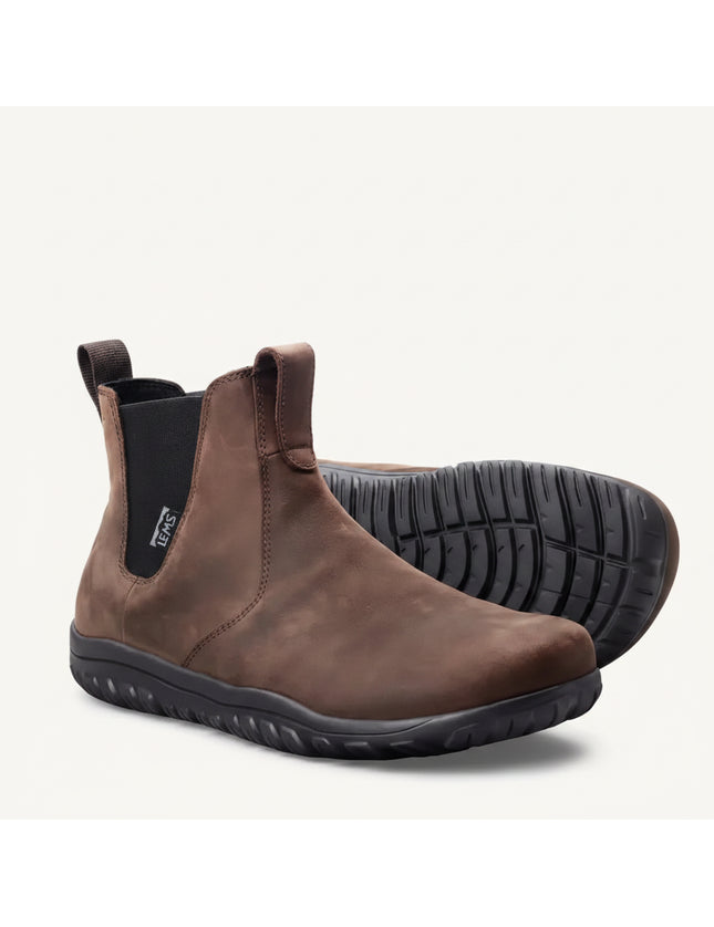 Pair of brown leather Chelsea boots with black elastic side panels and black soles