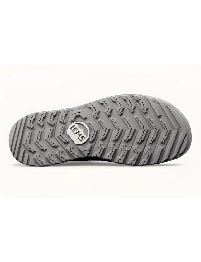 Underside of a gray shoe sole with a textured tread pattern and the LEMS logo