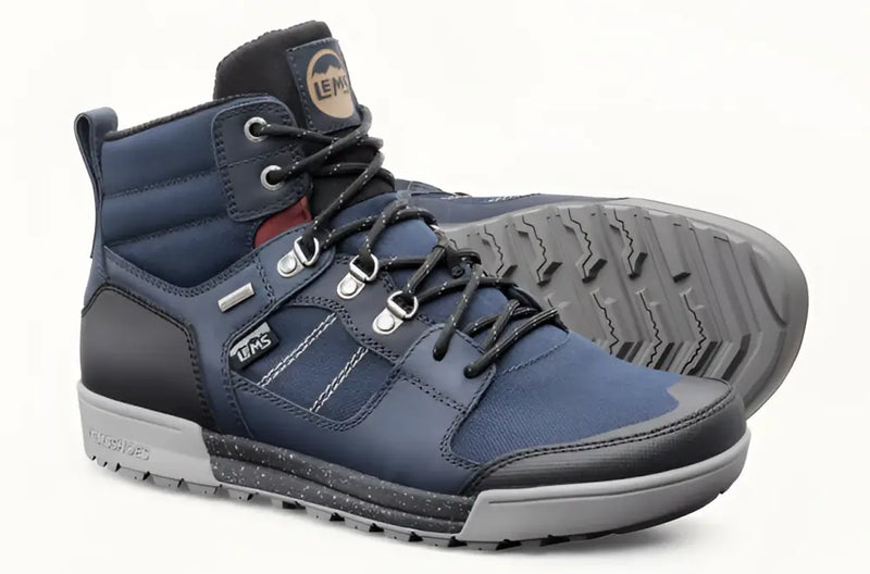 Pair of Lems waterproof blue and black hiking boots with grey soles