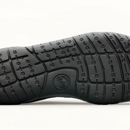 Black shoe sole with textured grip pattern