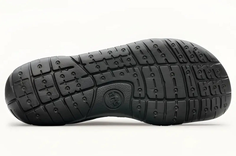 Black shoe sole with textured grip pattern