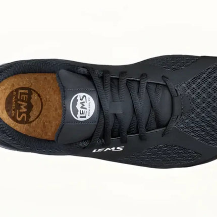 Top-down view of a black Lems Primal 2 shoe with a cork insole