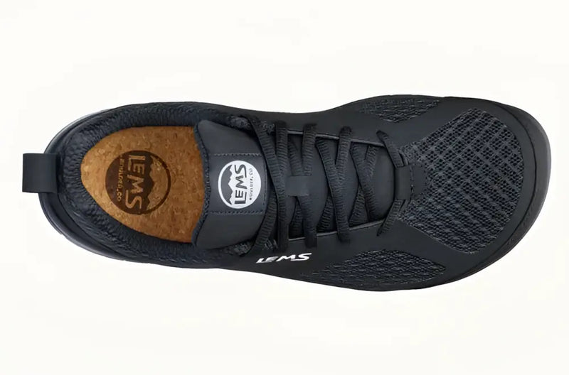 Top-down view of a black Lems Primal 2 shoe with a cork insole