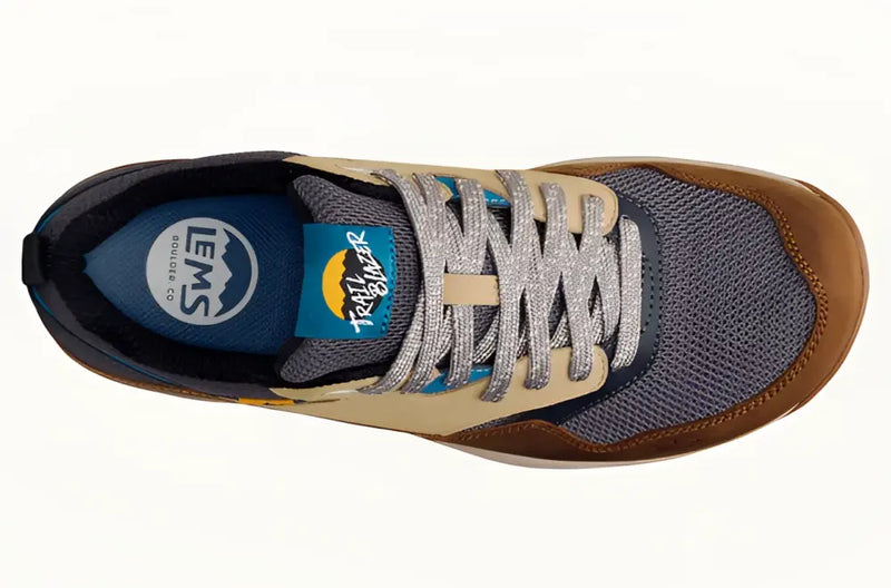 Overhead view of a brown, tan, and blue Lems Trailblazer shoe with silver laces