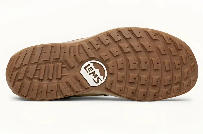 Brown shoe sole with Lems logo