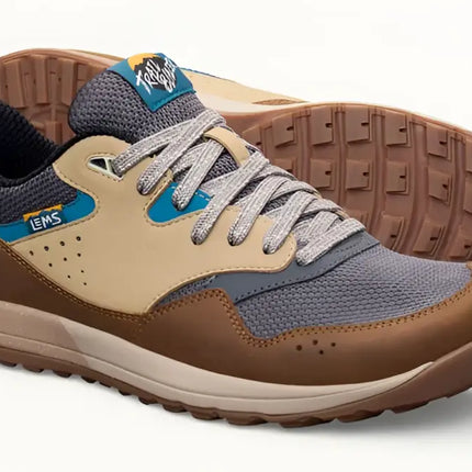Pair of Lems Trailhead V2 shoes in brown, tan, and blue with gray laces