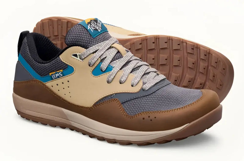 Pair of Lems Trailhead V2 shoes in brown, tan, and blue with gray laces