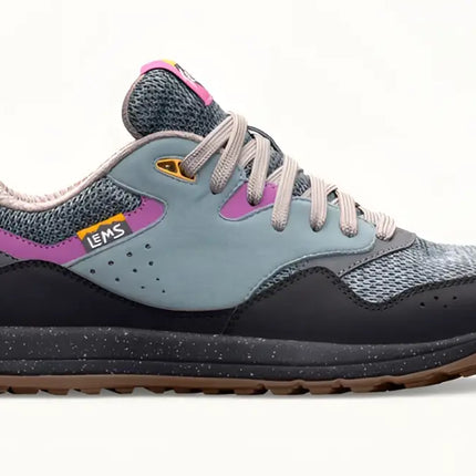 Lems Primal Pursuit shoe in grey, purple, and black with a speckled midsole and brown outsole