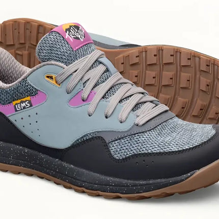 Pair of Lems Trailhead V2 shoes in gray, black, and pink with brown soles