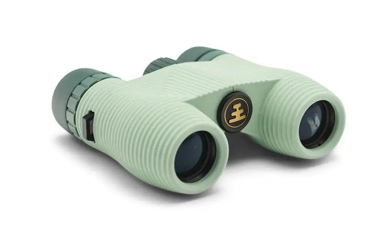 Light green binoculars with dark green accents and a gold logo