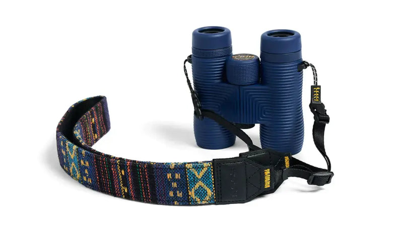 Blue binoculars with a patterned strap