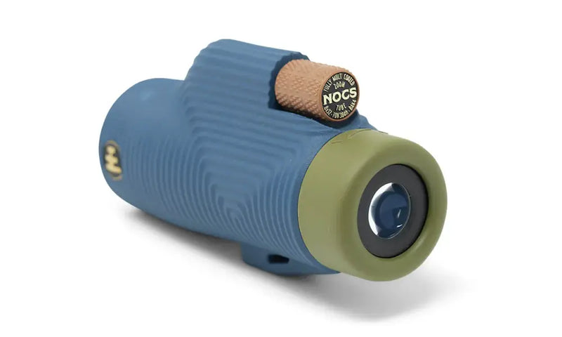 Blue and green monocular with a brown textured focus wheel