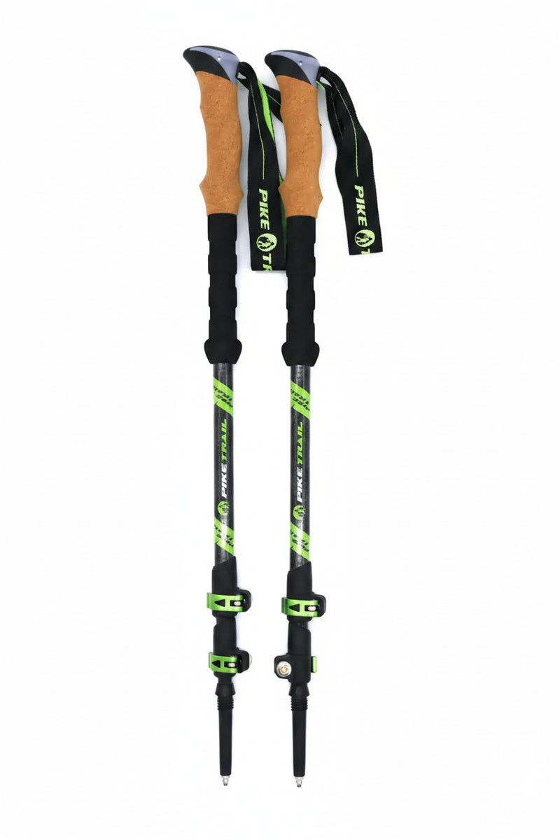 Pair of Pike Trail trekking poles with cork handles and green accents