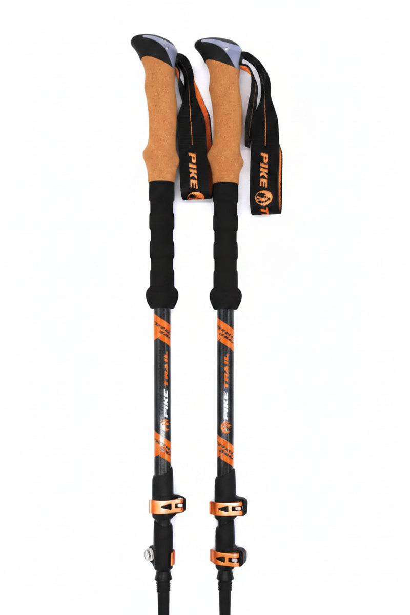 Pair of Pike Trail trekking poles with cork grips and orange accents