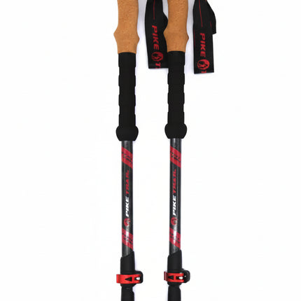 Pair of Pike Trail trekking poles with cork grips and red accents