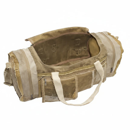 Open canvas duffel bag with multiple pockets and handles