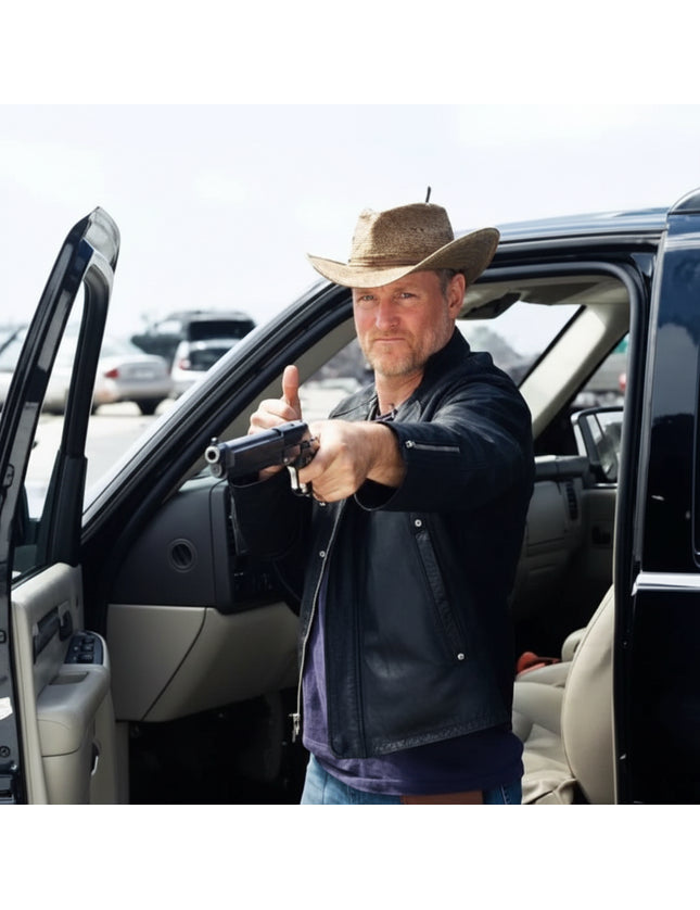 Man in cowboy hat and leather jacket holding a handgun, standing by an open car door