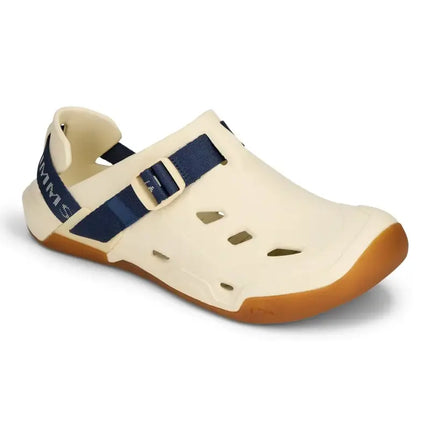 Cream colored water shoe with blue strap and brown sole