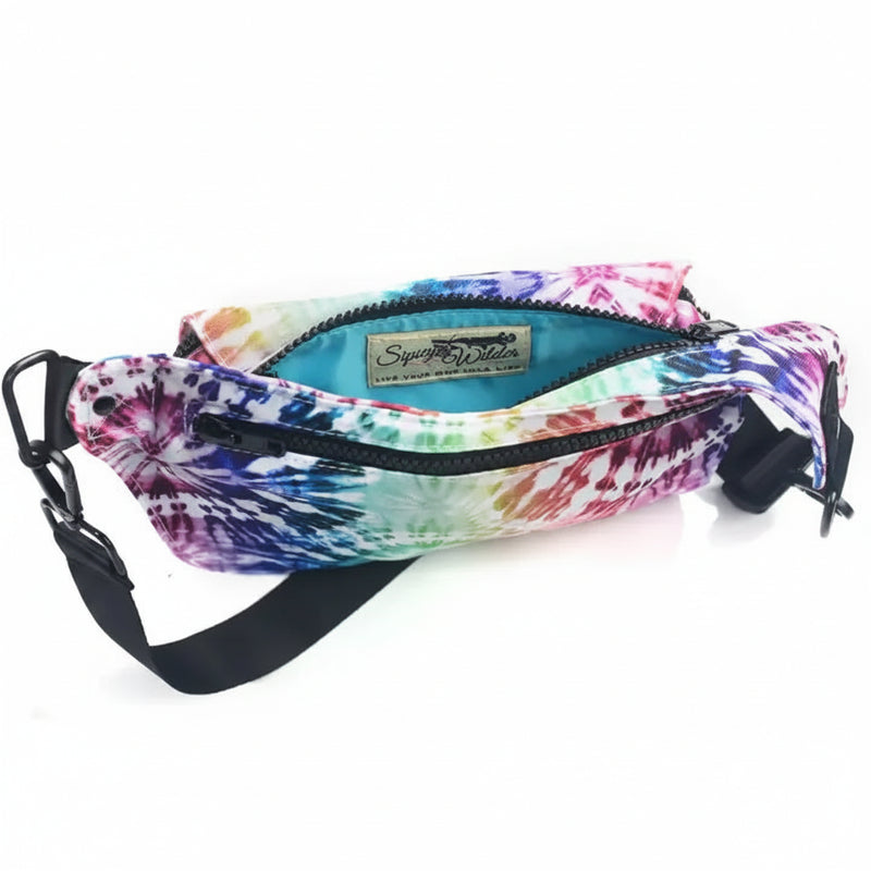 Tie-dye fanny pack with an open zipper revealing a light blue interior and a Sipsy Wilder brand tag