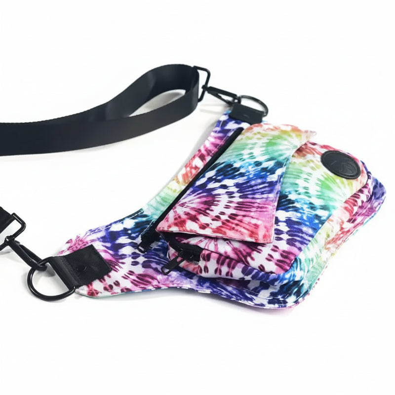 Tie-dye fanny pack with black strap and zippers
