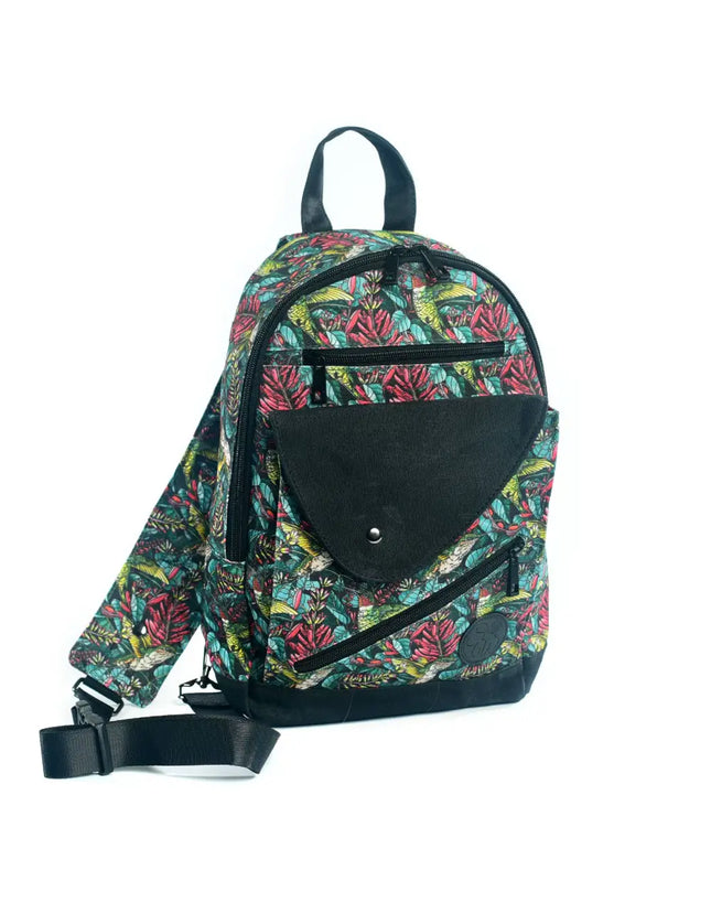 Tropical print sling bag with black flap pocket and adjustable strap