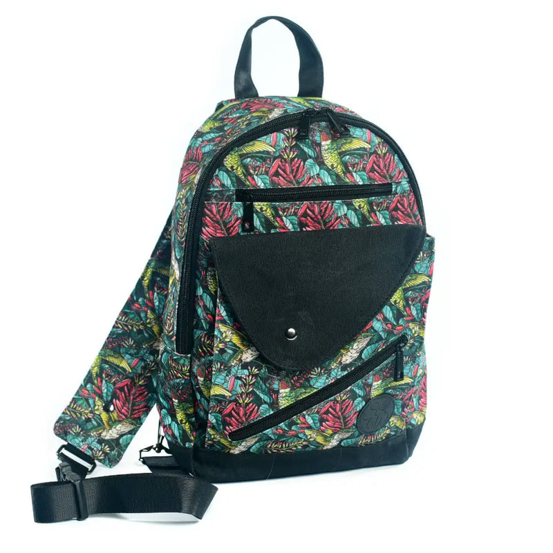 Tropical print sling bag with black flap pocket and adjustable strap
