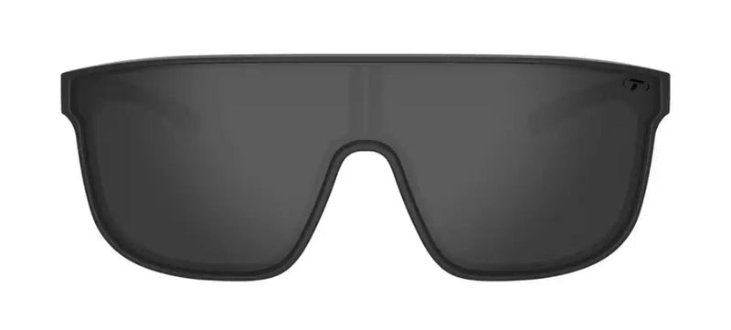 Black sunglasses with a single dark lens and a small T logo in the upper right corner