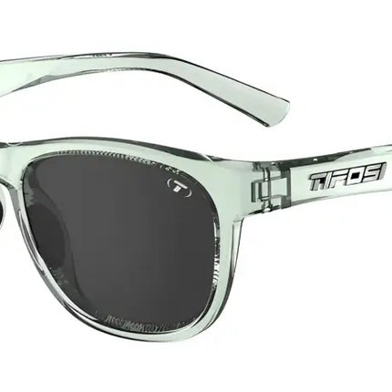 Light green sunglasses with dark lenses and the Tifosi logo on the side