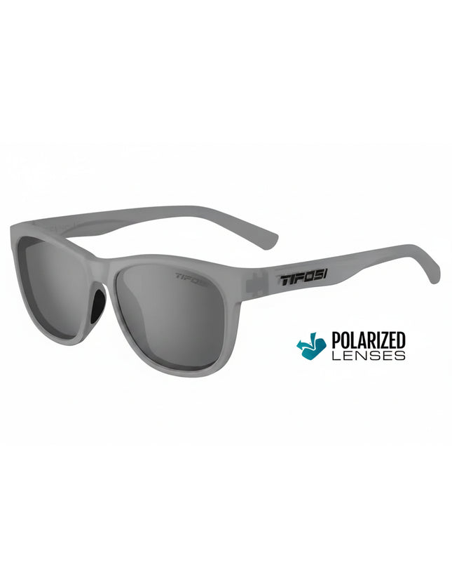 Light grey sunglasses with dark grey polarized lenses and Tifosi logo on the side