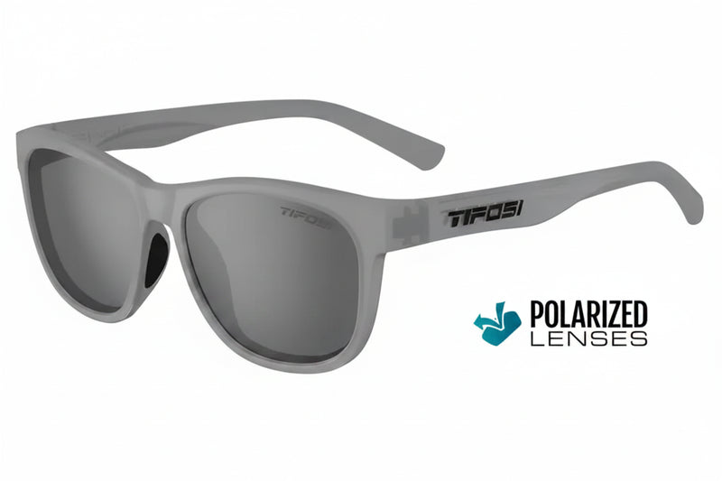 Light grey sunglasses with dark grey polarized lenses and Tifosi logo on the side