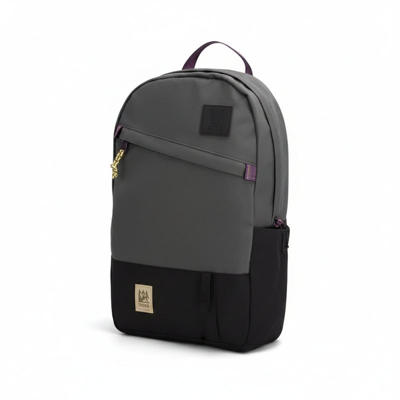 Two-tone grey and black backpack with purple accents and a gold rope zipper pull