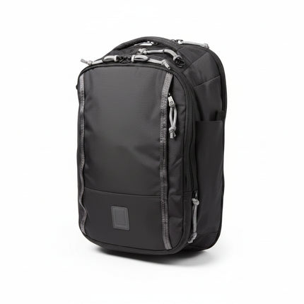 Black backpack with grey accents and multiple zippered compartments