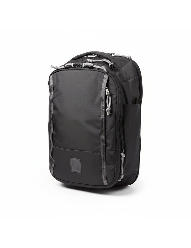 Black backpack with grey accents and multiple zippered compartments