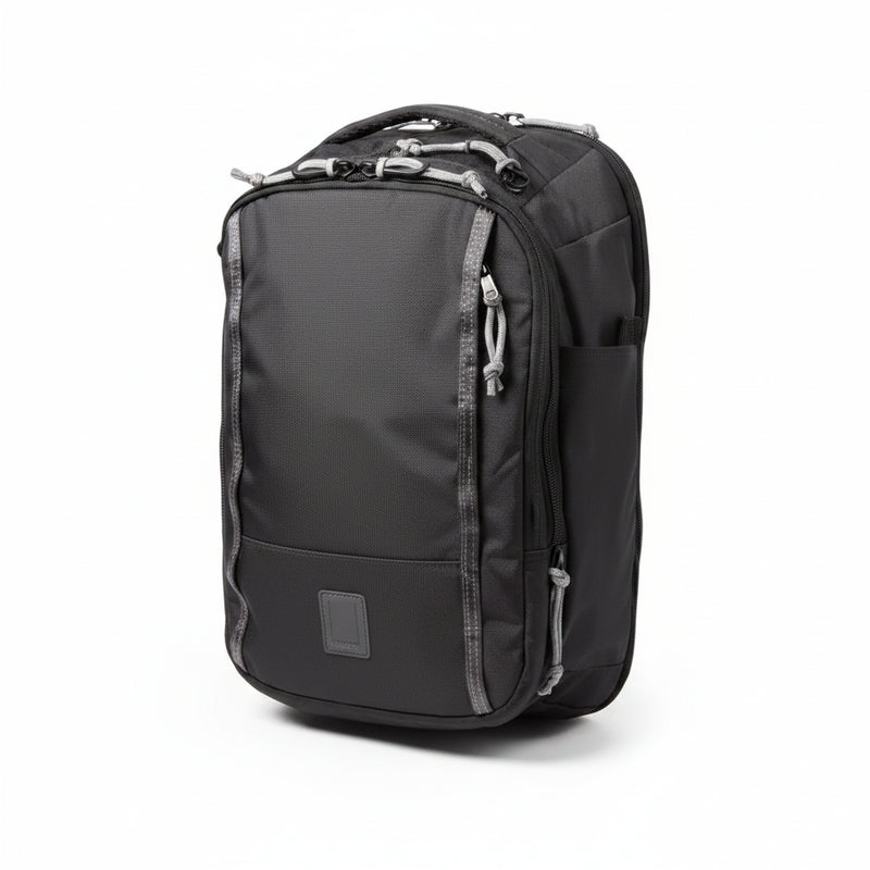 Black backpack with grey accents and multiple zippered compartments