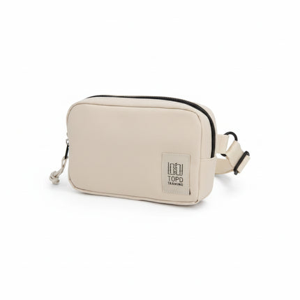 Topd Tarmiing beige rectangular pouch with black zipper and adjustable strap