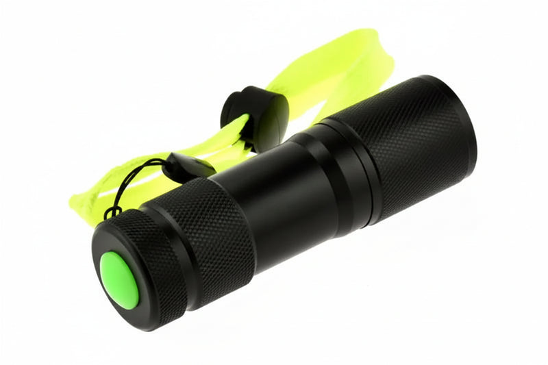 Black flashlight with a green button and a neon yellow wrist strap