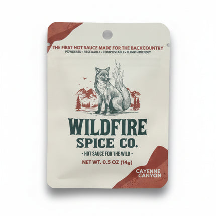Wildfire Spice Co Cayenne Canyon hot sauce packet with a fox and mountains graphic