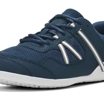 Navy blue athletic shoe with white soles and white and gray stripes on the sides