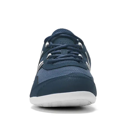 Front view of a navy blue athletic shoe with white soles and laces